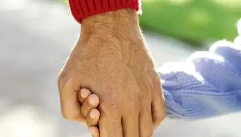 hands father and son